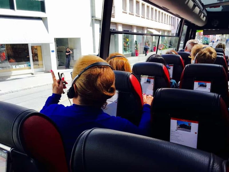 Basel: Sightseeing Bus Tour with Audio Guide - The stops that matter most, from cathedral zone to Dreiländereck