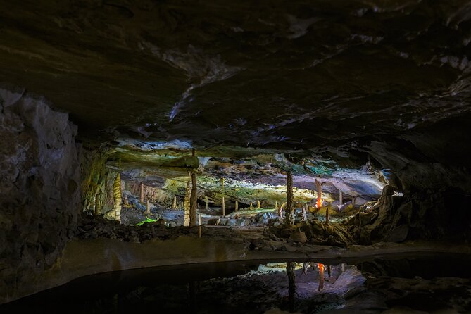 Beatus Caves, Panoramic Bridge, Nature Park Blue Lake and Lake Thun Cruise - Interlaken to Lake Thun, an 8.5-hour loop of caves, bridges, and blue water