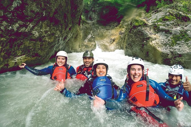 Canyoning Interlaken with OUTDOOR - Entering The Canyon: The 10m Rappel and First Water Entries