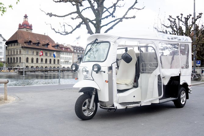 City Tour Plus Lucerne by Etuktuk - Chapel Bridge: the explanation is the attraction