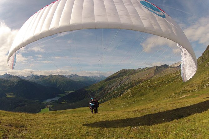 Davos Absolutely Free Flying Paragliding Tandem Flight 1'000 Meters High - Views above the Swiss Alps, with optional steering and maneuvers