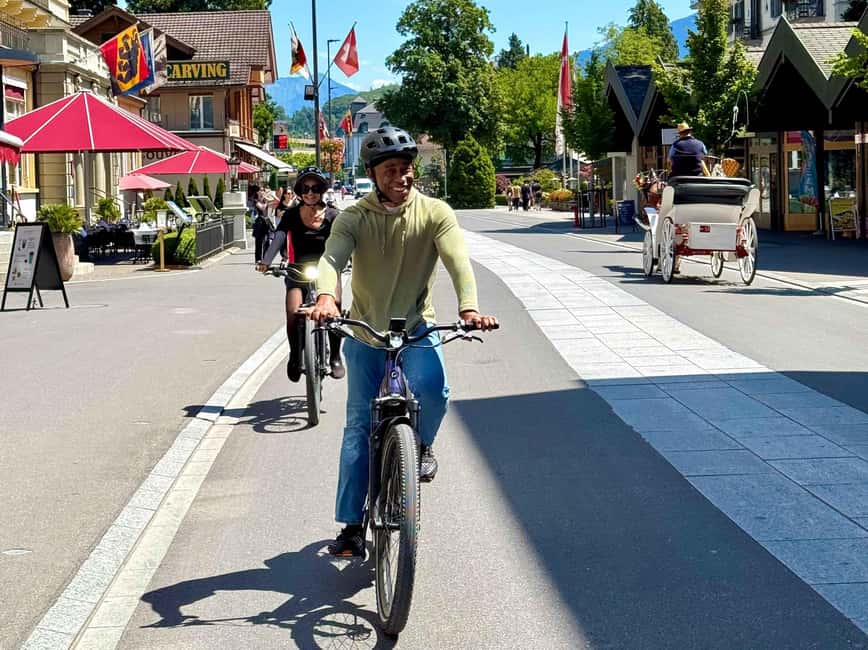 Discover Interlaken E-Bike Tour - Lakes Ruins and Views - Crossing the Aare: Interlaken Ost, casino park, fountain, and a change in scenery