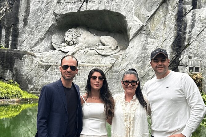Exclusive Panoramic Train Journey though the Heart of Swiss - Lucerne in 45 Minutes: Lion Monument, Chapel Bridge, and Jesuit Church