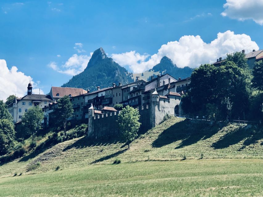 From Geneva: Gruyére Chocolate and Cheese Tasting Day Trip - Gruyères Castle and the medieval streets you can actually enjoy