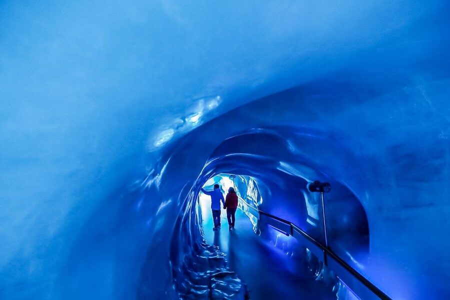 From Lucerne: Mount Titlis Half-Day Tour with Ice Flyer - Entering the glacier world from Lucerne