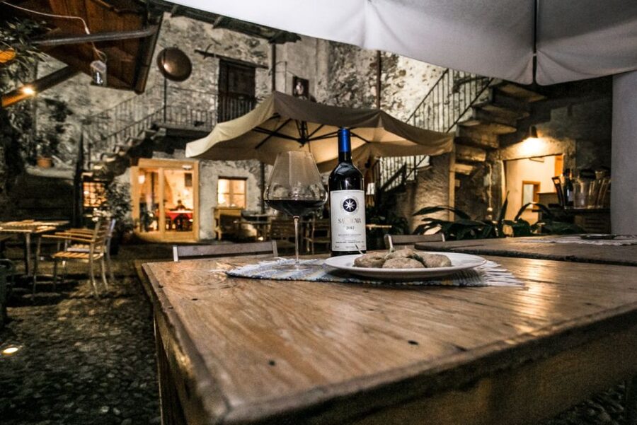 From Saint Moritz: Bernina Red Train with Winery Tasting - Tirano tasting at a historic wine shop, what you will drink and eat
