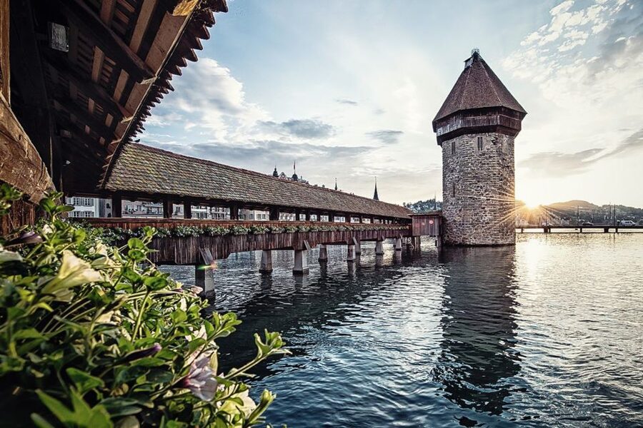 From Zurich: Day Trip to Lucerne with Optional Yacht Cruise - Lucerne on foot: Chapel Bridge, Water Tower, Jesuit Church, and the town vibe