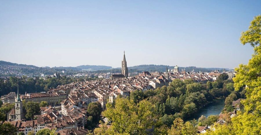 From Zurich/Lucerne: Berne Capital and Countryside Day-Trip - Entering Bern: Münster, arcades, Parliament, and the Aare river
