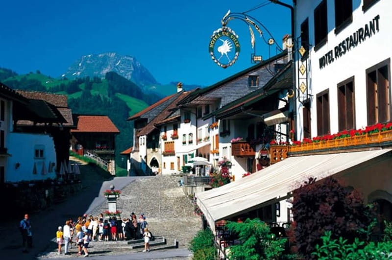 Geneva: Gruyères Tour with Chocolate, Cheese & Golden Train - Gruyères Village Free Time: Cobblestones, Castle Views, and Cowbells (Maybe)