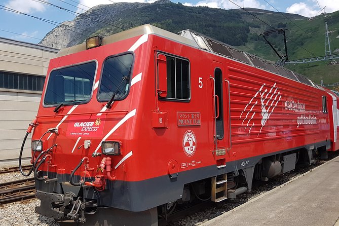 Glacier Express Panoramic Train Round Trip from Zürich With Private Guide - Oberalp Pass and Andermatt: altitude, options, and quick alpine hits