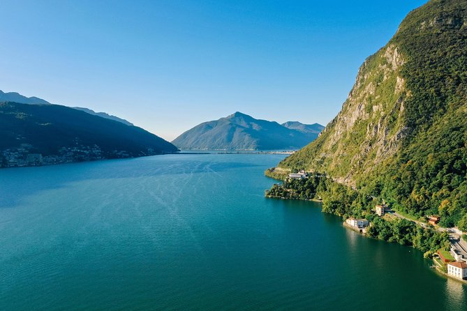 Guided Walk from Lugano to Gandria promoted by Lugano Region - return by boat - Cantine di Gandria, Swiss Customs Museum, and grotti for a practical break