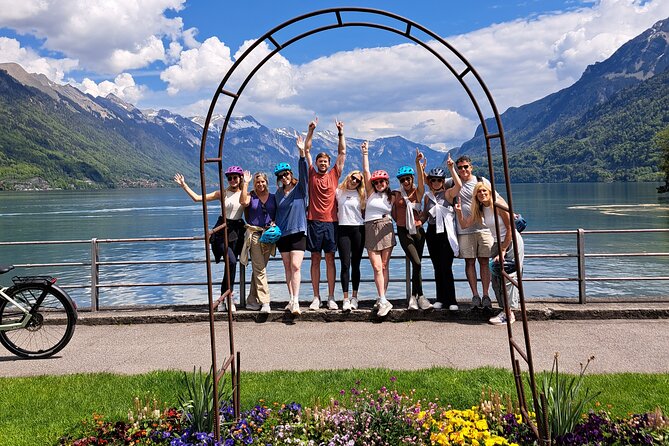 Interlaken 3-Hour Guided E-Bike Tour with a Farm and Ancient Villages Visit - Lake Thun: blue water, mountain backdrops, and quick photo breaks