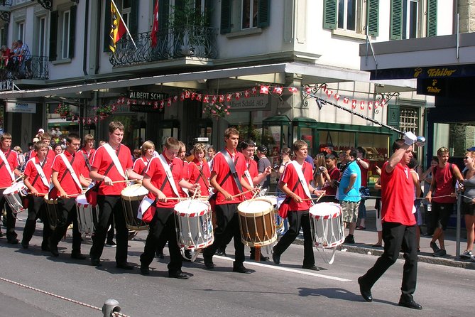 (KTG361) - Interlaken day trip by bus from Geneva - Lauterbrunnen-style waterfall time: the Bernese Oberland hit, fast