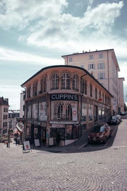 Lausanne: Walking Tour with Chocolate Tastings & Metro - Escalier du Marché, Rue du Bourg, and the Montbenon viewpoint break