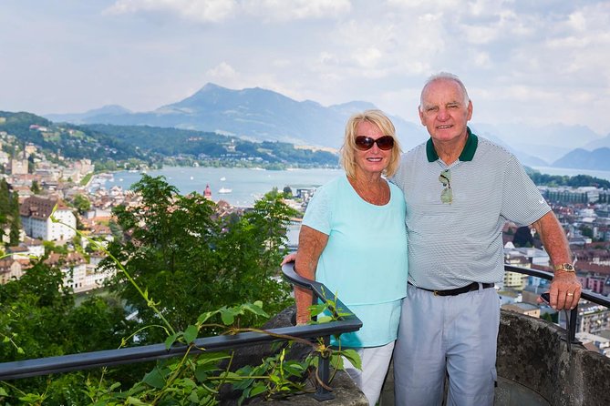 Lucerne Private Walking Tour with a castle visit! - Chapel Bridge: history plus the paintings and architecture details