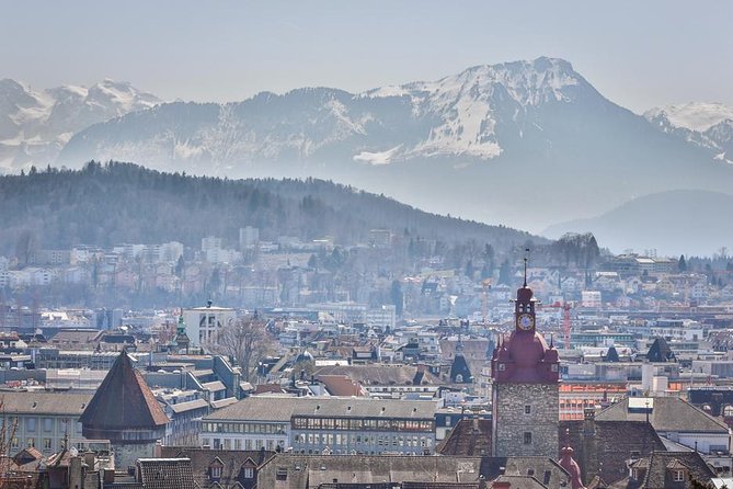 Lucerne Private Walking Tour with a castle visit! - Lion Monument and Lake Lucerne: stepping from memory to water views