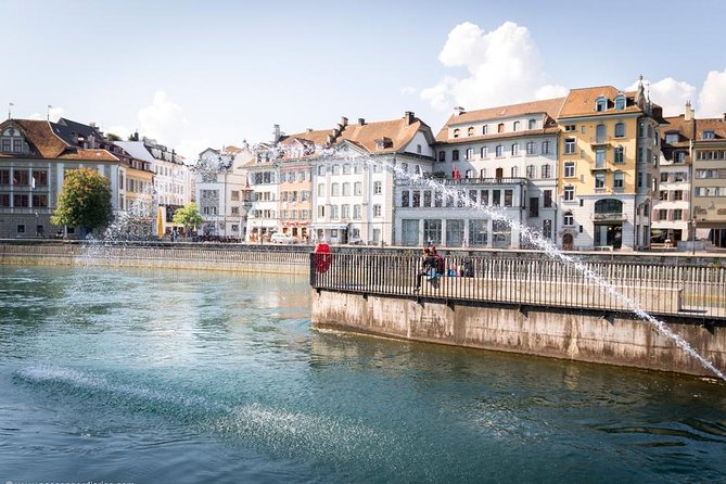 Lucerne Walking & Boat Tour: The Best Swiss Experience - Towers, fortifications, and the wall walk that makes Lucerne feel strategic