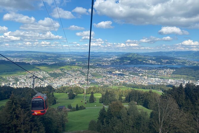 Mt. Pilatus & Lake Lucerne Cruise Small Group Tour | From Basel - Lake Lucerne cruise: calm water, big mountain backdrops, and seasonal routes