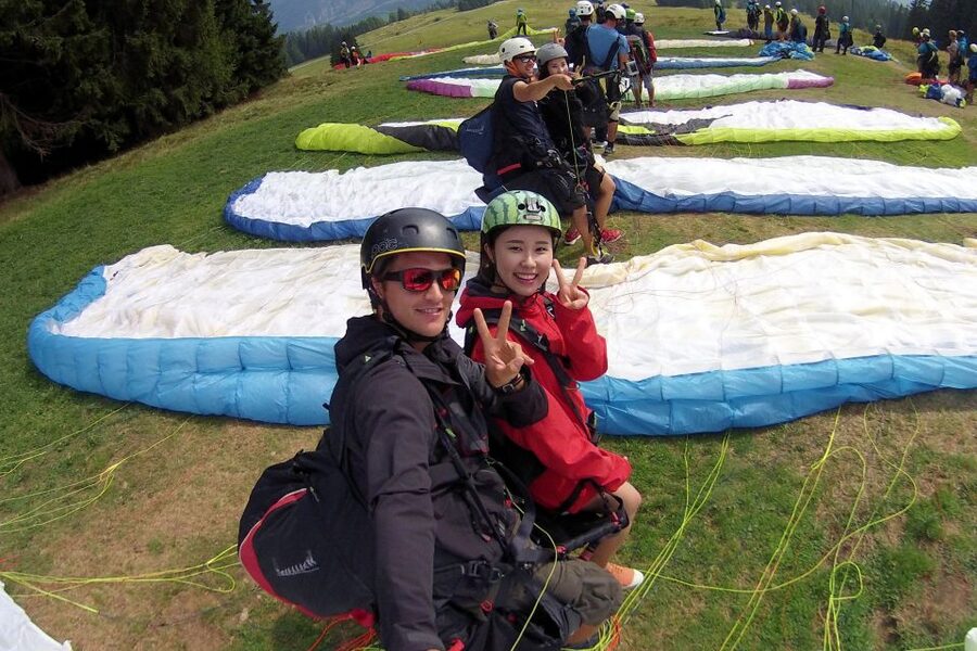 Paragliding Tandem Flight in Interlaken - The Short Walk to the Takeoff Area, With Alps All Around