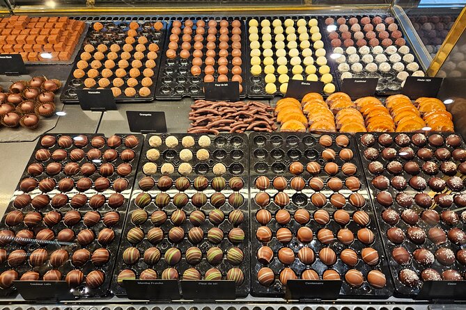 Private Chocolate Tour in Geneva by Tuk Tuk - Stop 1: Place Bourg du Four for a Factory Feel in the Old Town
