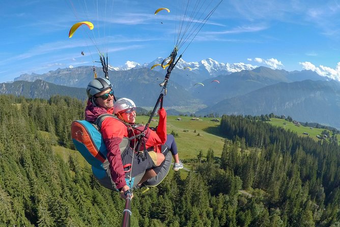 Tandem Paragliding Experience from Interlaken - Check in, safety briefing, and harnessing with real people