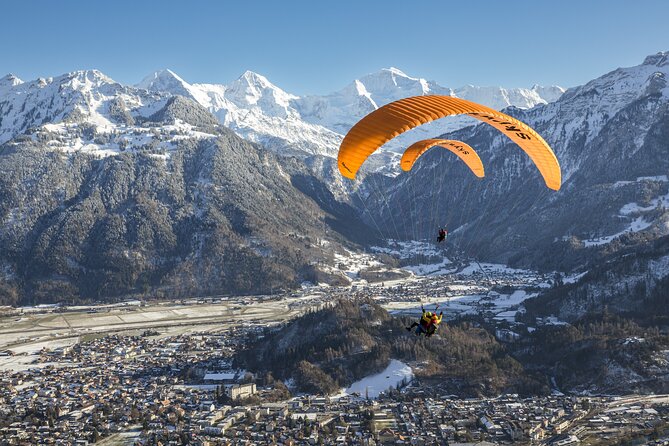 Tandem Paragliding Experience with Transport from Interlaken - What About Photos and Video Add-Ons?