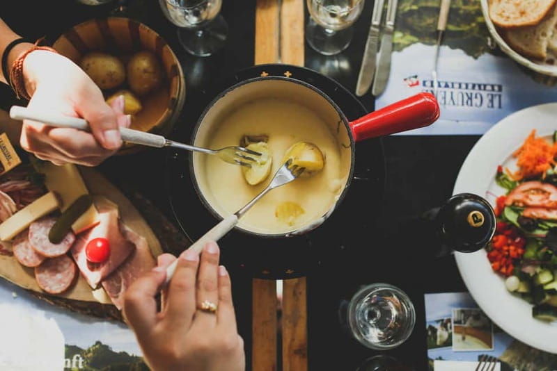 Taste Geneva: Exclusive Walking Food Tour with Full Meal - The flavors you might eat: charcuterie, pâté, and fondue moitié-moitié