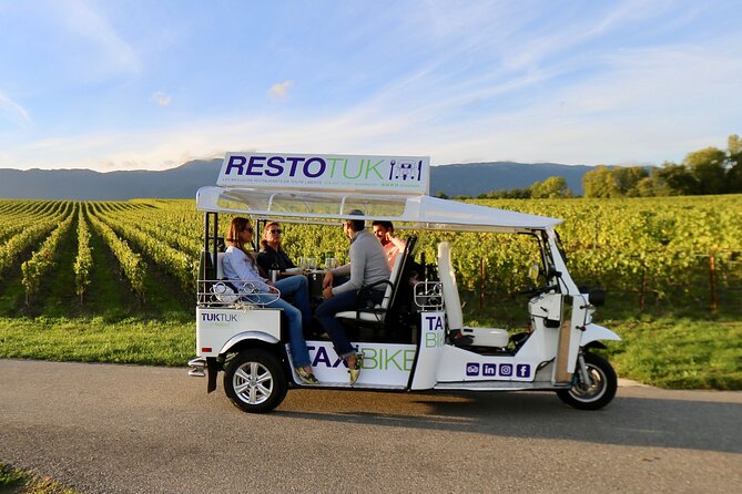 The Private Tuk Tuk Tour with one of The Best Fondues in Geneva! - Molard Tower and the Flower Clock: Geneva’s time and power themes