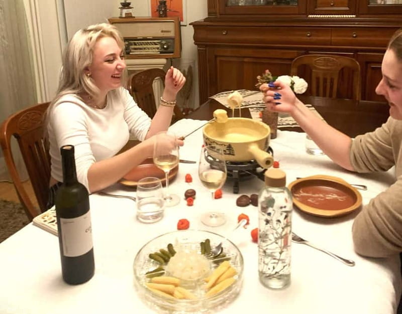 Traditional Swiss Dinner: Cheese Fondue, Appetizers/Dessert - Basel’s cozy home setting, fireplace mood, and that “you’re expected” feeling