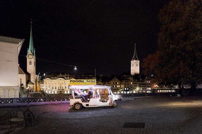 Zurich eTukTuk Private Tour - with Cheese Fondue and Wine - Limmatquai and Old Town Energy Without the Long Walk