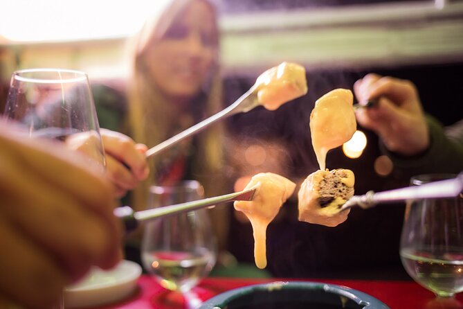 Zurich eTukTuk Private Tour - with Cheese Fondue and Wine - Bahnhofstrasse’s Centerpiece Energy, Plus More Photo Time