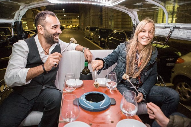 Zurich eTukTuk Private Tour - with Cheese Fondue and Wine - The First Stretch: Bahnhofstrasse, River Views, and the Big Church Names