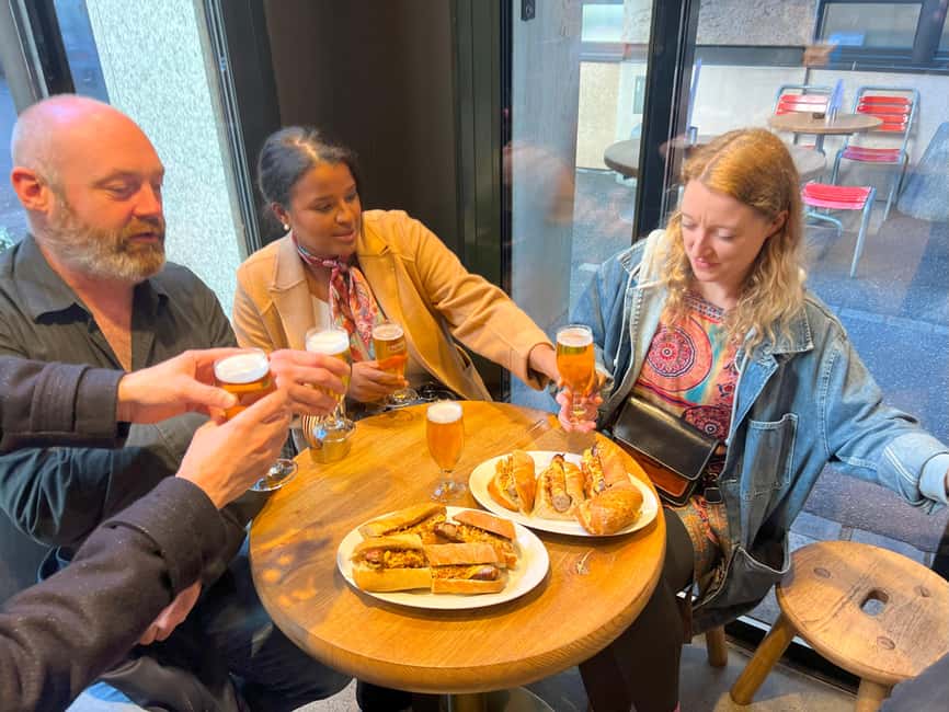 Zurich: Food Tour of 8+ Tastings with Cheeses & Chocolates - Cheese tastings at the cheesemonger, plus Chäschüechli and hay schnaps