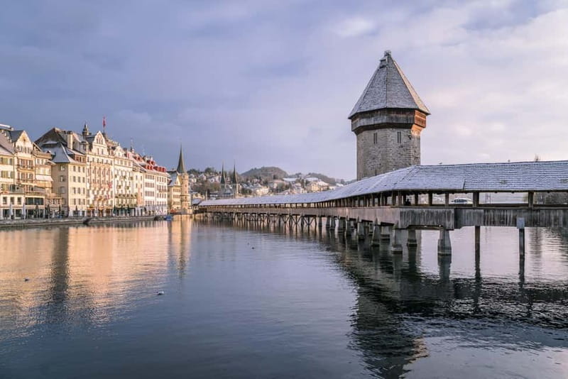 Zurich: Lucerne Trip, Igloo Fondue and Titlis Rotair Option - Titlis Cliff Walk and Ice Grotto: When the Summit Adds Story