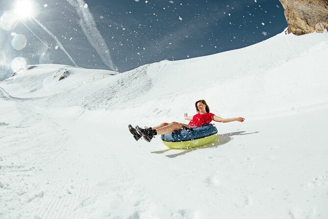 Zurich to Lucerne and Titlis Tour with Igloo Fondue Experience - Titlis Rotair, Cliff Walk, and Ice Grotto: the big-ticket altitude moment